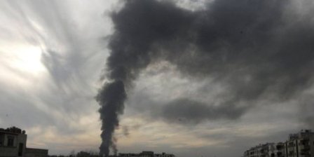 Smoke rises from Mleha suburb of Damascus