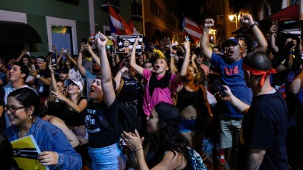 Demonstrators celebrate after the resignation of Puerto Rico Governor Ricardo Rossello_Gabriella N. Baez_Reuters