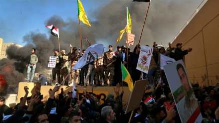 Hundreds of protesters stormed the US embassy compound in Baghdad's heavily fortified Green Zone_Khalid Mohammed_AP Photo