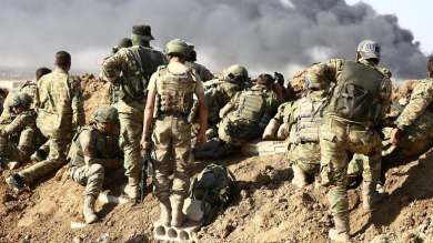 Truppe turche e forze di opposizione siriane appoggiate dalla Turchia si radunano fuori dalla città di confine di Ras al-Ain_AFP