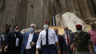 Macron visited the site of the explosion and areas of the city damaged by the massive blast _Thibault Camus_AP Photo